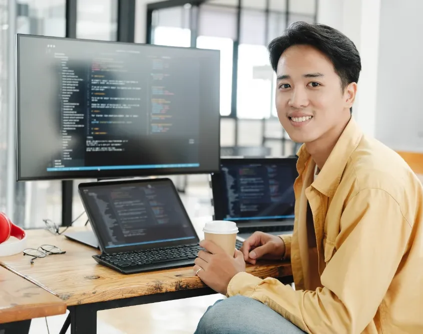 young-programmer-working-on-desktop-pc-in-office-o-2026-01-09-07-46-42-utc